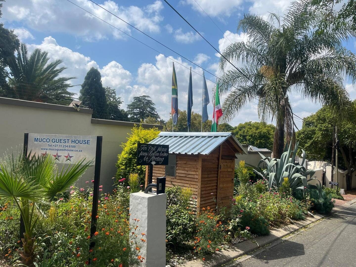 Muco Guesthouse signage on the street in Rivonia, Sandton